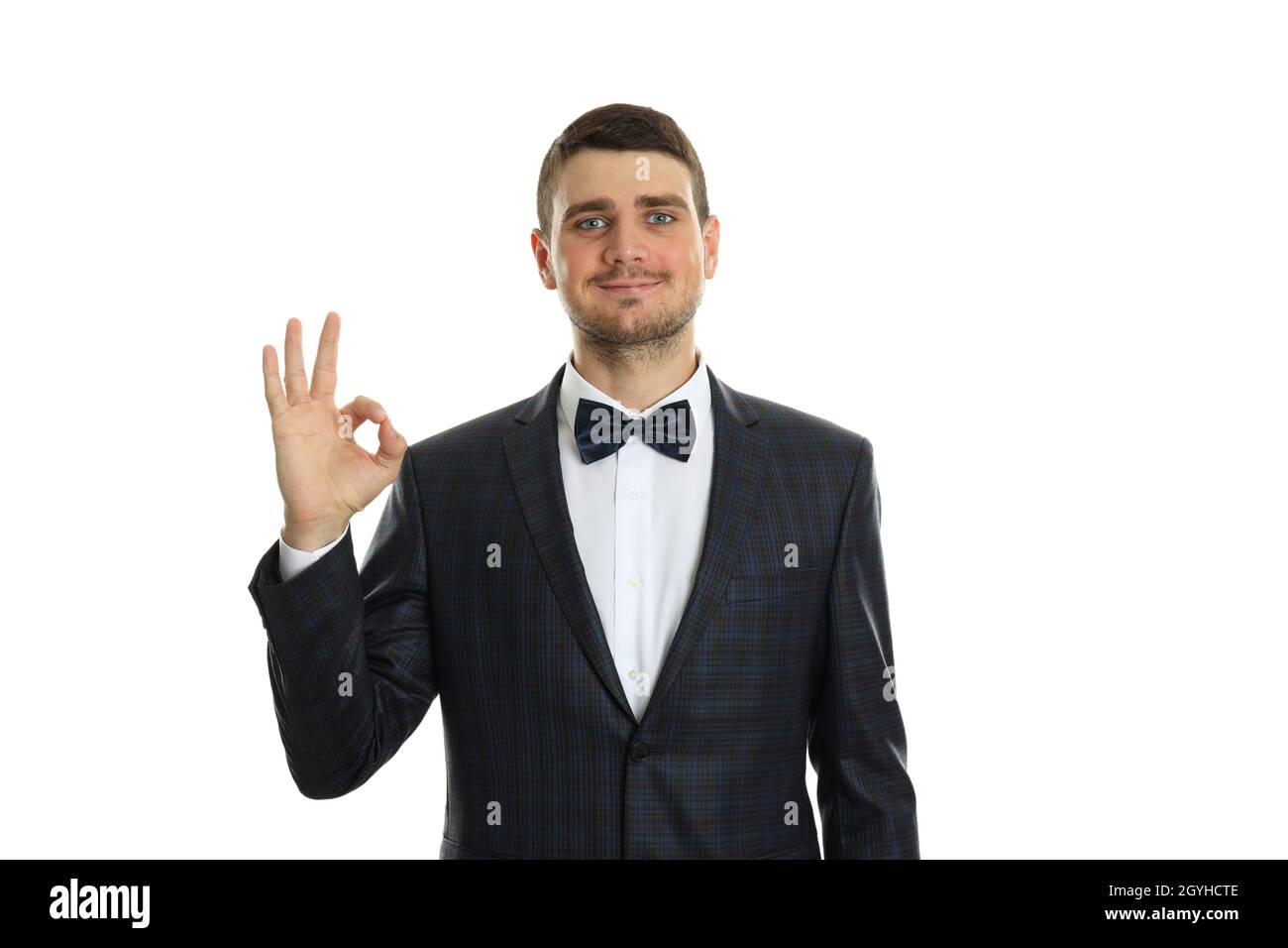 Geschäftsmann zeigt ok Schild, isoliert auf weißem Hintergrund. Stockfoto