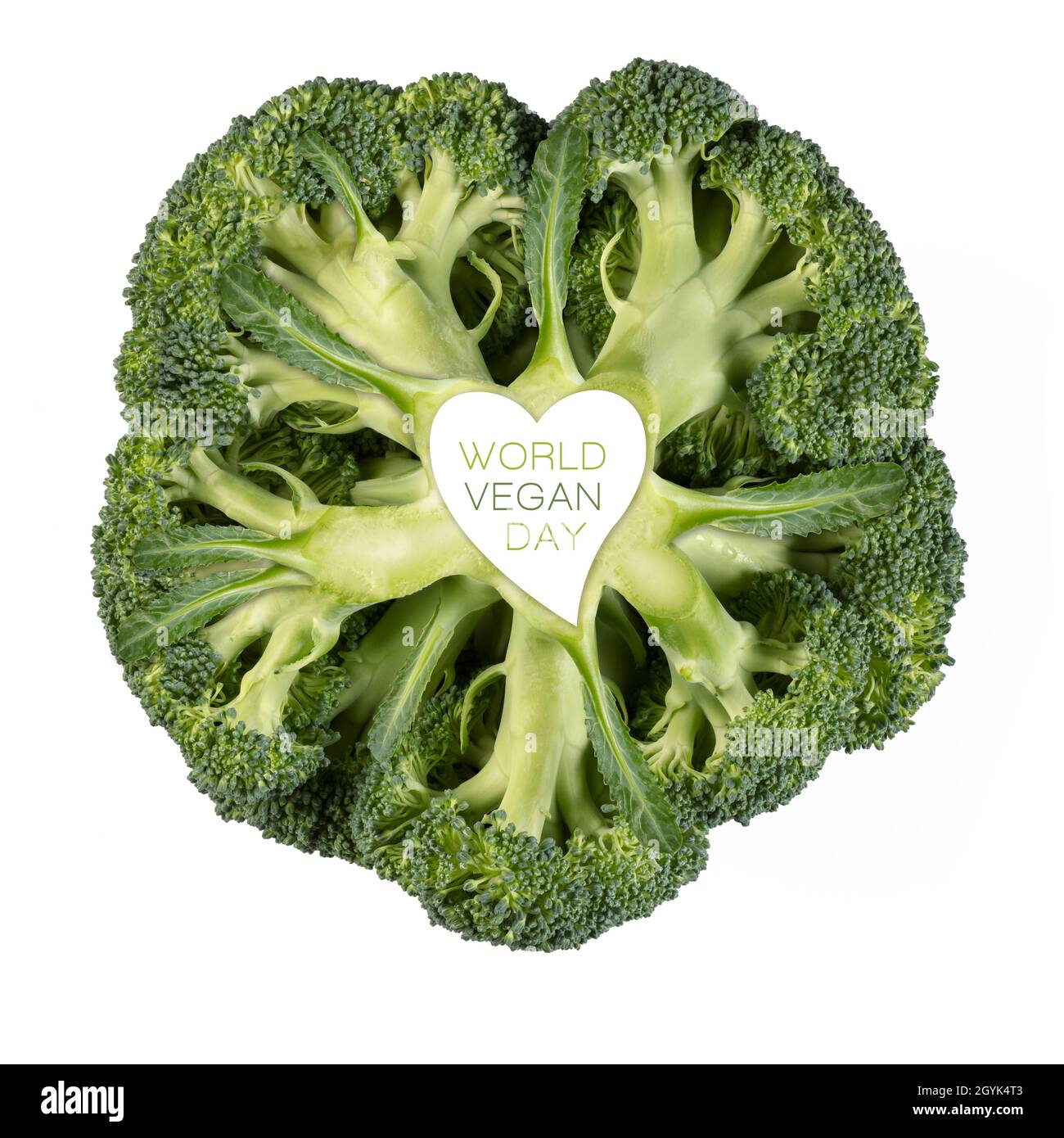 World Vegan Day Design mit einem frischen Kopf aus Brokkoli mit Herzzeichen und Text auf dem Stamm in einer gesunden pflanzlichen Ernährung und Superfood-Konzept zu isolieren Stockfoto