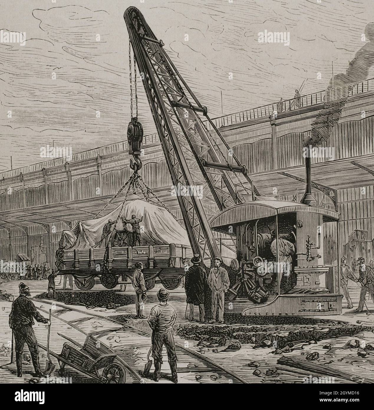 Frankreich, Paris. Internationale Ausstellung von 1878. Dampfkran für den Transport von Güterwagen auf den Eisenbahnen, die während der Arbeiten der Veranstaltung verwendet werden. Gravur. La Ilustración Española y Americana, 1878. Stockfoto