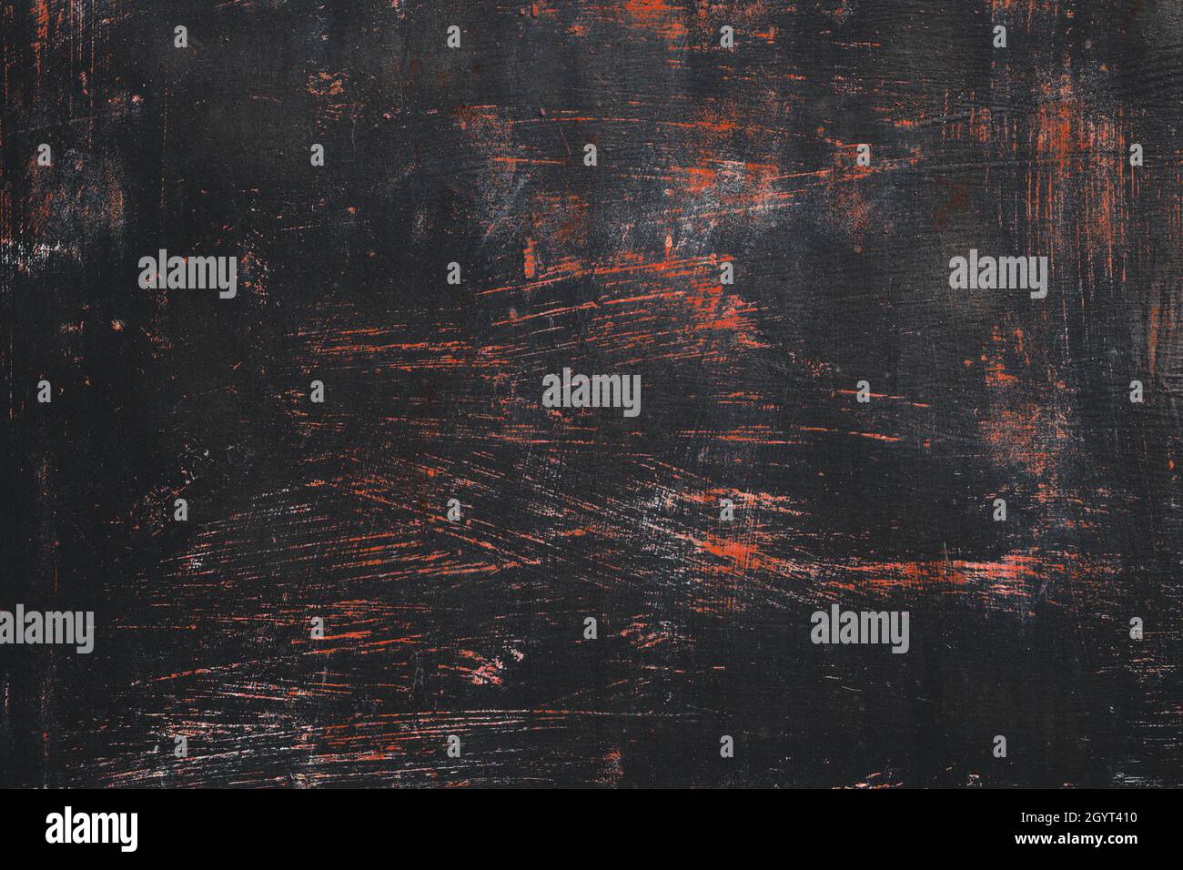 Alte Grunge-Metallstruktur mit Schichten von schwarzer und roter abgenutzter Farbe Stockfoto