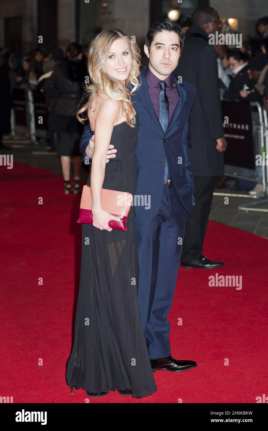 Justin Nappi (Produzent) und Gast kommen zur Premiere von Arbitrage, Odeon West End, Leicester Squure, London Stockfoto