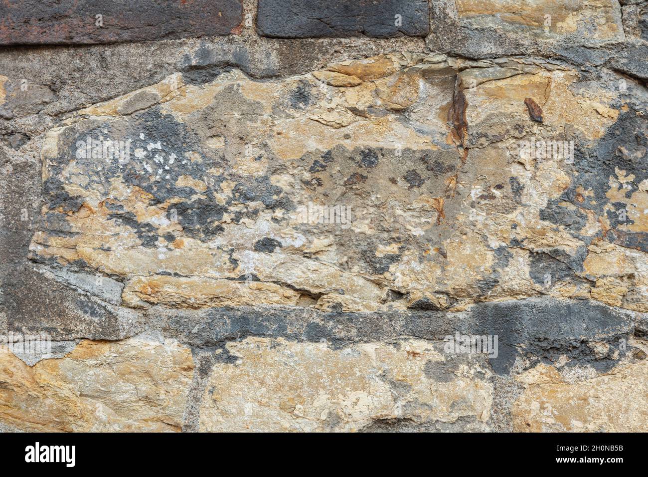 Alte Steinwand Textur Hintergrund. Nahaufnahme. Stockfoto