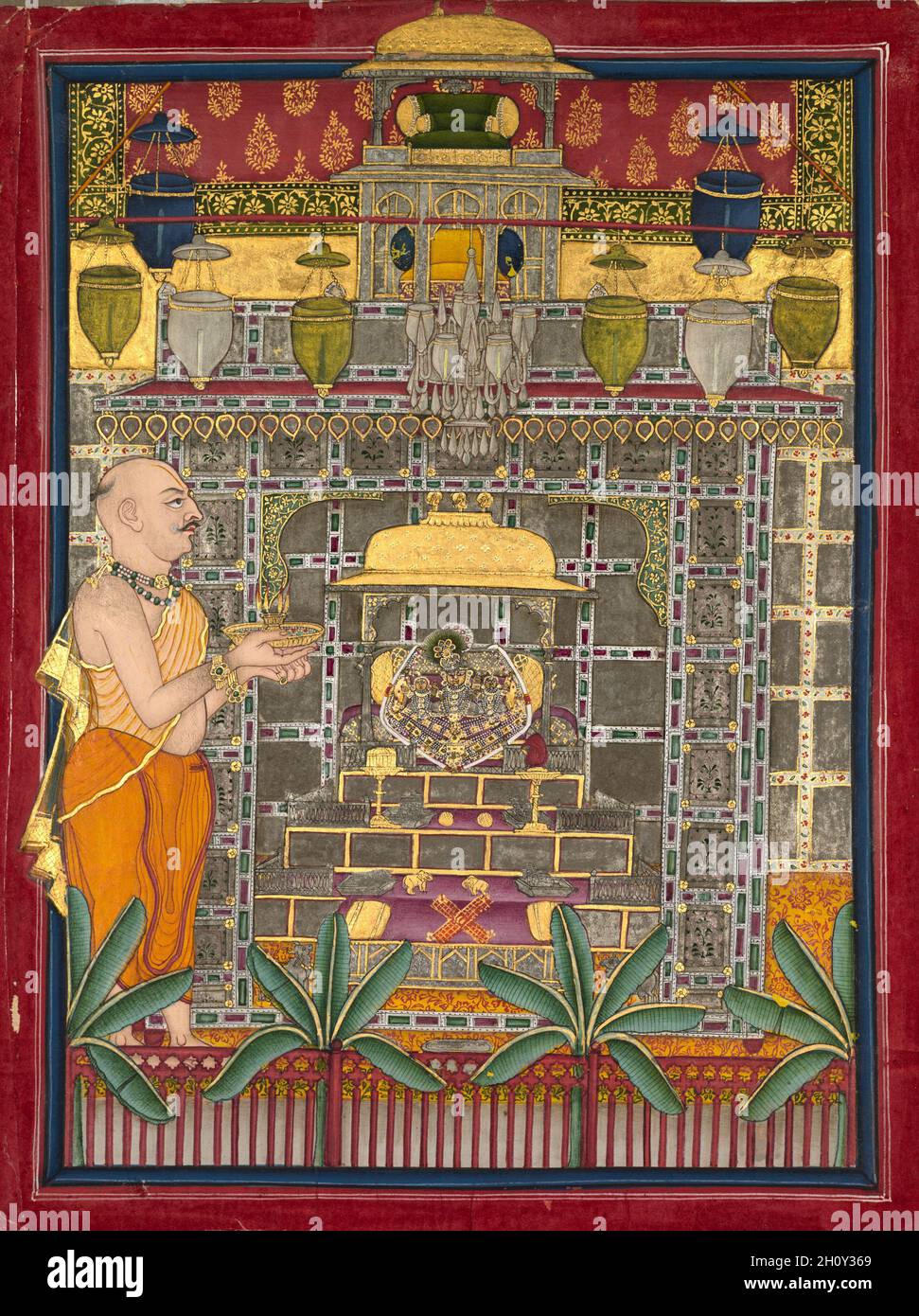 Maharao Kishor Singh II. Von Kota (r. 1819–28) die Anbetung Krishnas als Brij Rajji, c. 1825. Nordwestindien, Rajasthan, Rajput Königreich Kota. Gummi-Tempera, Silber und Gold auf Papier; insgesamt 24.5 x 18.8 cm (9 5/8 x 7 3/8 Zoll). Der Herrscher des kleinen fürstlichen Staates Kota, gekleidet als Priester der Puschti-Marg-Sekte, hält eine Lampe mit fünf Flammen. Er huldigt einer Triade aus Metallbildern mit Krishna in der Mitte, flankiert von zwei Konsorten, die in einem kleinen Kiosk mit Metallplatten, die Licht reflektieren, verankert sind. Diese Ikone wird nur in Kota verehrt. Eine Vielzahl von Glaslampen hängen herum Stockfoto