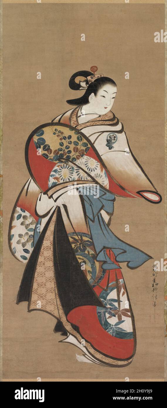 Kurtisane, 1716-1735. Matsuno Chikanobu (Japanisch). Hängende Schriftrolle; Tinte und Farbe auf Papier; insgesamt: 179.1 x 58.5 cm (70 1/2 x 23 1/16 Zoll); insgesamt: 177.8 x 52.7 cm (70 x 20 3/4 Zoll); nur auf Malerei: 91 x 35.5 cm (35 13/16 x 14 Zoll); nur auf Malerei: 91.8 x 39.6 cm (36 1/8 x 15 9/16 Zoll). Ein glamouröser Kurtisane ist mit einem äußeren Gewand ausgestattet, der mit großen Rondellen mit Pflanzenmotiven wie Iris und Buschklee verziert ist. Über das Leben und die künstlerische Ausbildung des Malers Matsuno Chikanobu, eines Ukiyo-e-Künstlers, der in einem Stil malte, der stark an den des Kaigetsud erinnert, ist wenig bekannt? studio. Stockfoto