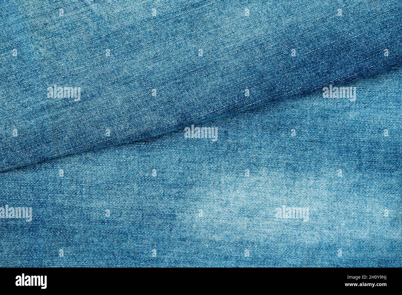 Blaue Jeans Textur Hintergrund, faltige Denim Textur Hintergrund Stockfoto