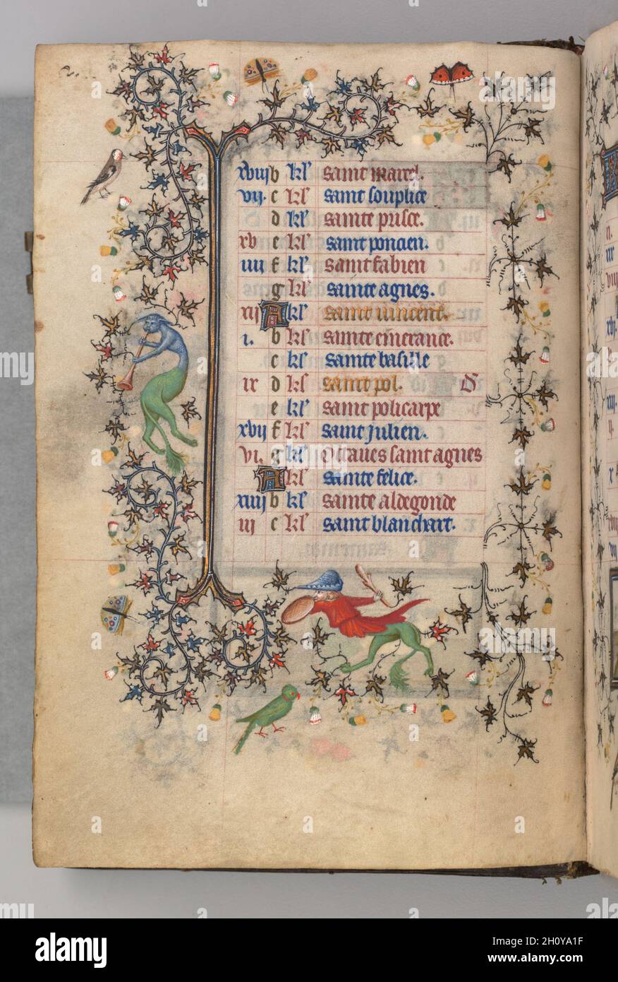 Stunden von Karl dem Noblen, König von Navarra (1361-1425): Fol. 1v, Januar, c. 1405. Master of the Brussels Initials and Associates (Französisch). Tinte, Tempera und Gold auf Pergament; Codex: 20.3 x 15.7 x 7 cm (8 x 6 3/16 x 2 3/4 Zoll). Dieses wertvolle Buch wurde von seinem Besitzer, Karl III., König von Navarra, hochgeschätzt, einem in Frankreich geborenen Prinzen, dessen Wappen auf 20 Blättern gemalt ist. Charles besuchte Paris bei zahlreichen Gelegenheiten und erwarb wahrscheinlich diesen Band dort im Jahr 1404. Paris war damals das Zentrum des europäischen Buchhandels und zog Illuminatoren aus vielen Teilen Europas an. Dieses Manuskript repr Stockfoto
