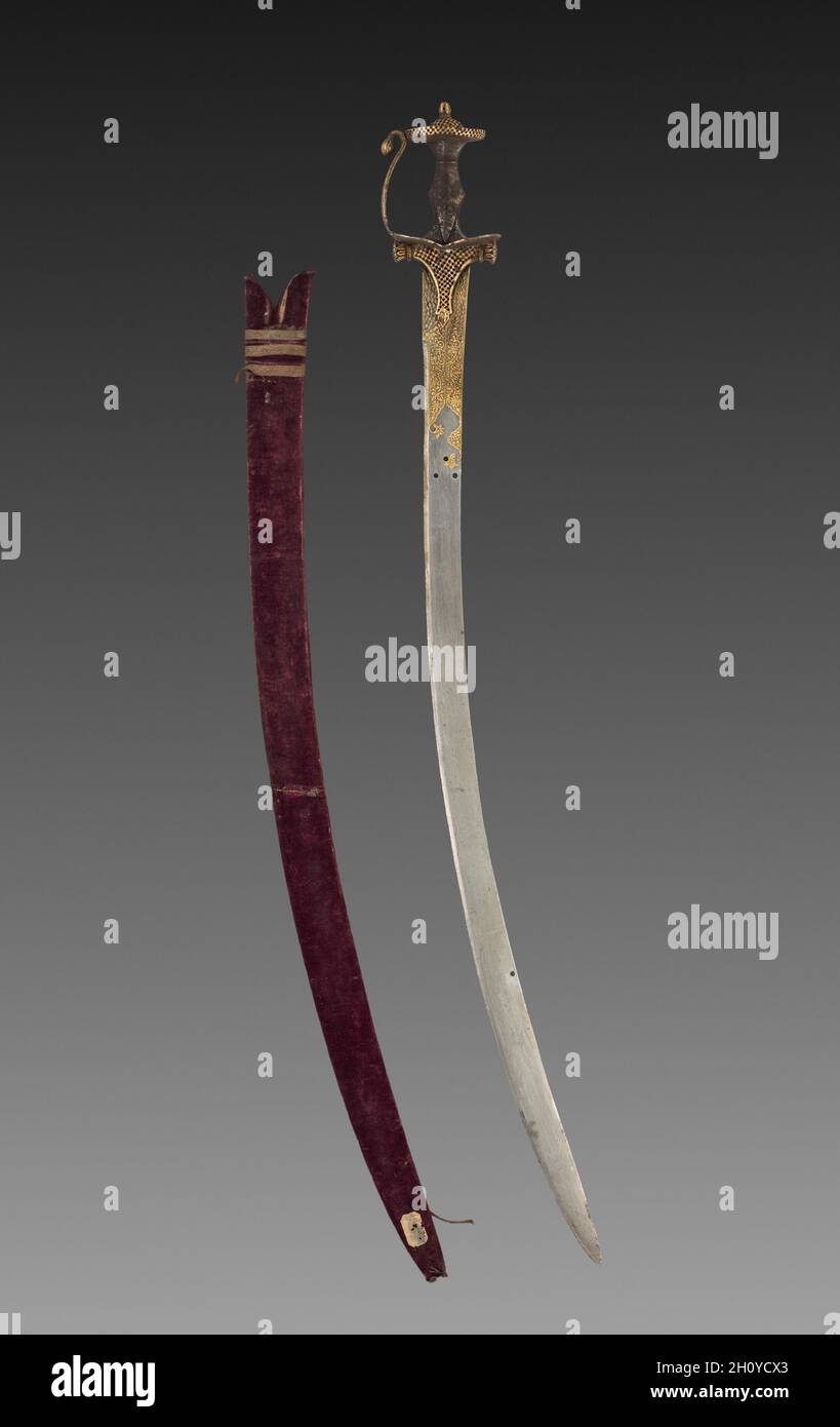Tulwar Schwert, 1700. Diese lange gebogene Klinge und Scheide sind von der  Art und von der Mogule Adel getragen, wie sie häufig in der Malerei zu  sehen. Die durchbrochene Griff ist ein