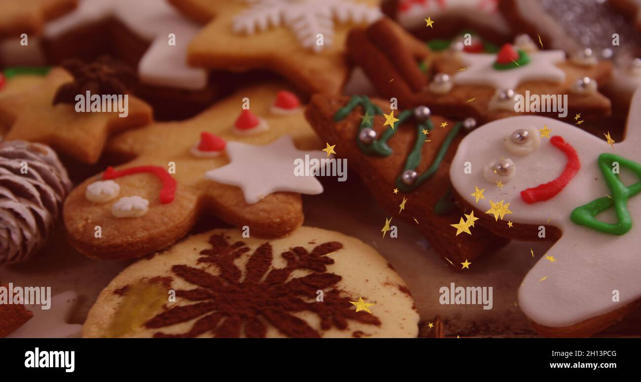 Bild von Sternen schweben über Ingwer Mann weihnachtskekse Stockfoto