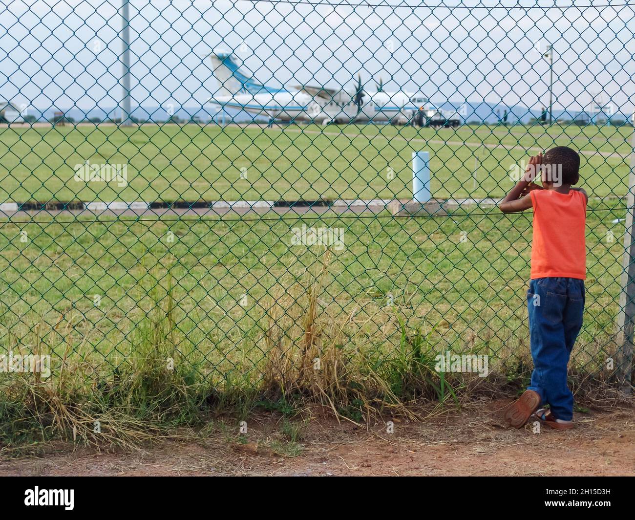 Familientreffen Flüchtling, warten auf den Plan Stockfoto