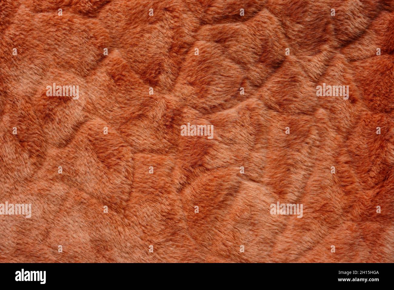 Rostfarbenes Kunstpelz mit Muster. Stockfoto