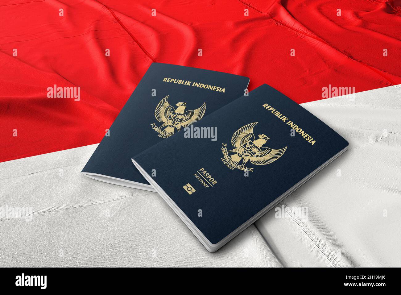 Indonesischer Pass auf der indonesischen Flagge ist ein indonesischer Pass ein Reisedokument, das von der indonesischen Regierung ausgestellt wird Stockfoto