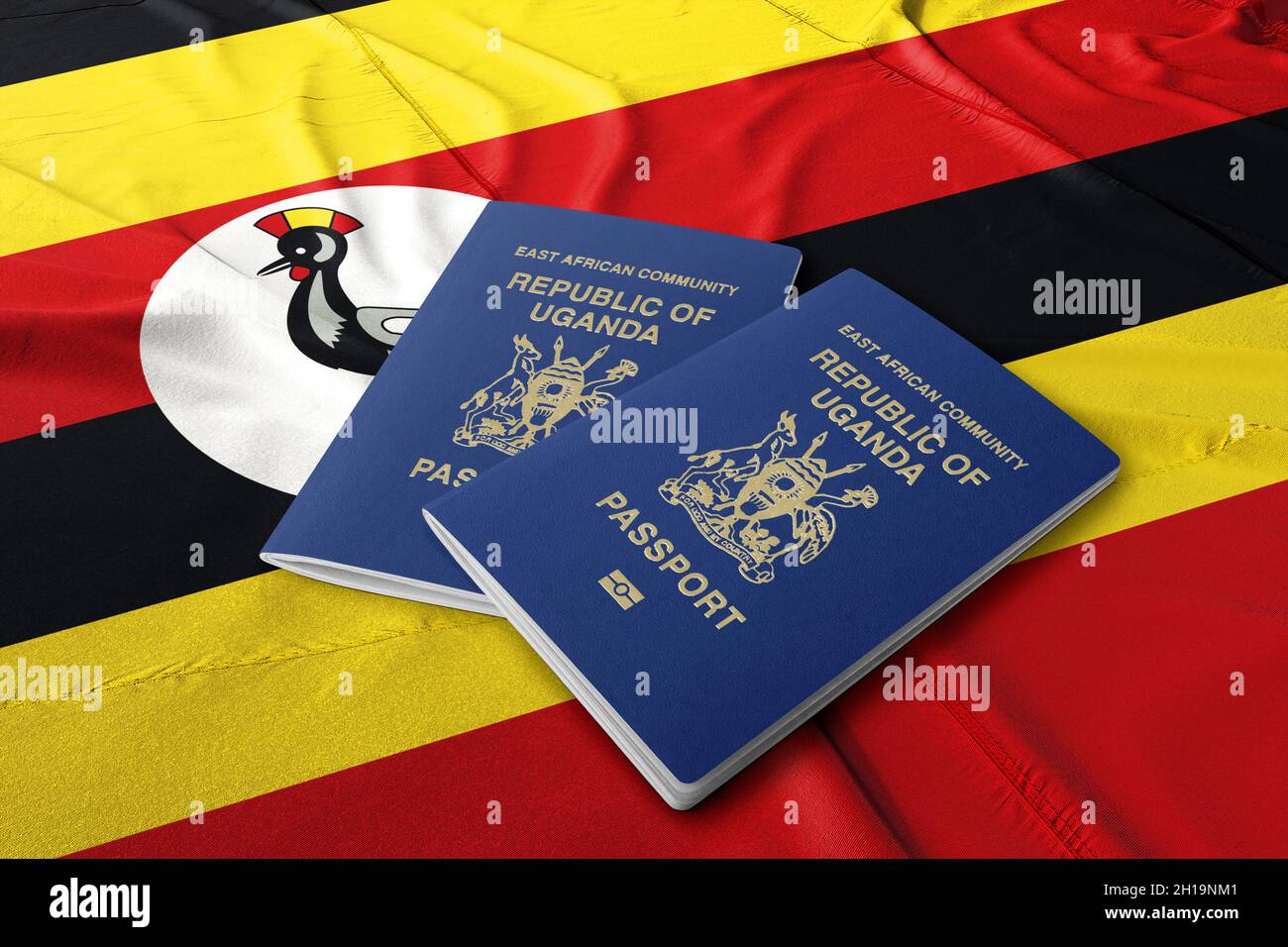 Uganda-Pass mit Uganda-Flagge, Staatsbürgerschaft durch Investitionen Stockfoto