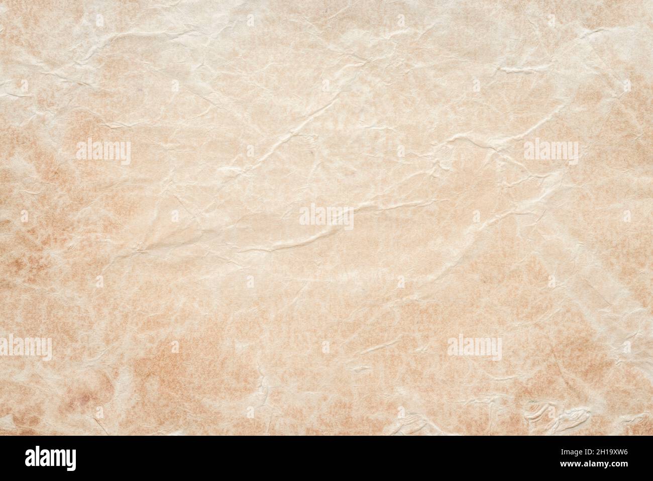 Nahaufnahme der alten antiken Papiertextur. Vintage gefärbtes Papier Hintergrund. Stockfoto