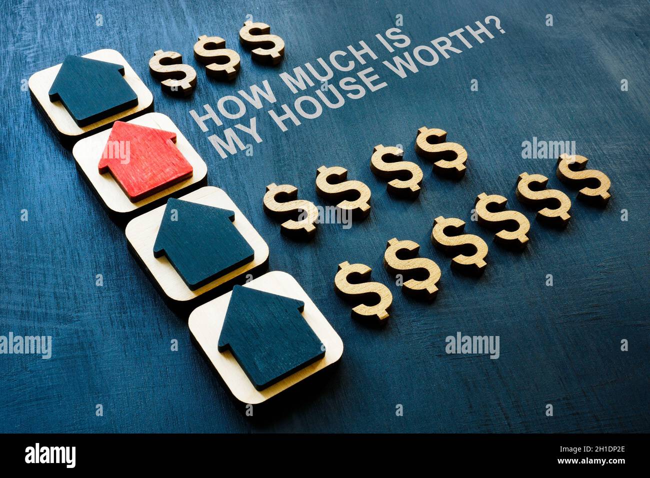 Kleine Häuser und Frage, wie viel ist mein Haus wert. Stockfoto