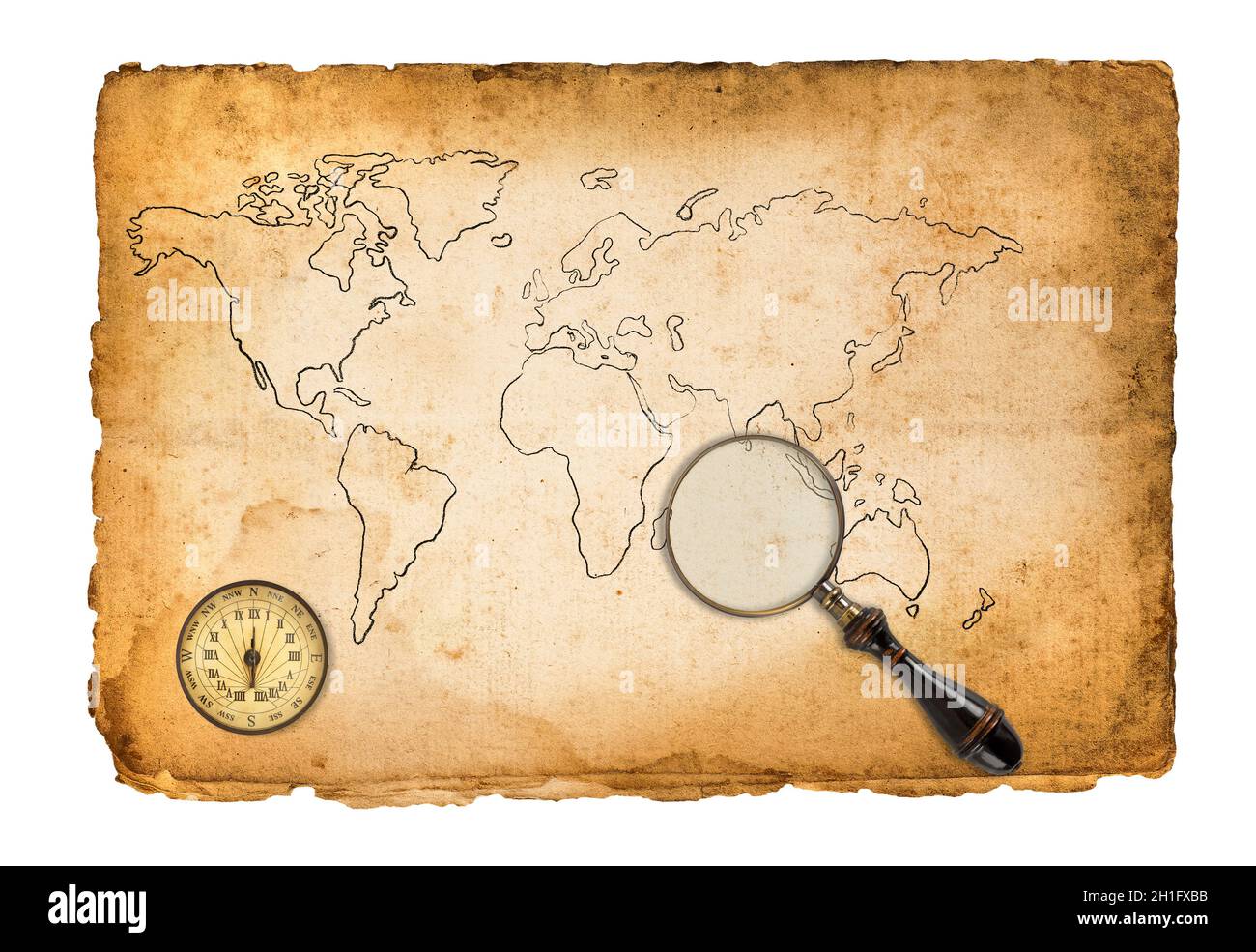 Alte Karte mit Kompass und Lupe isoliert auf Weiß Stockfoto