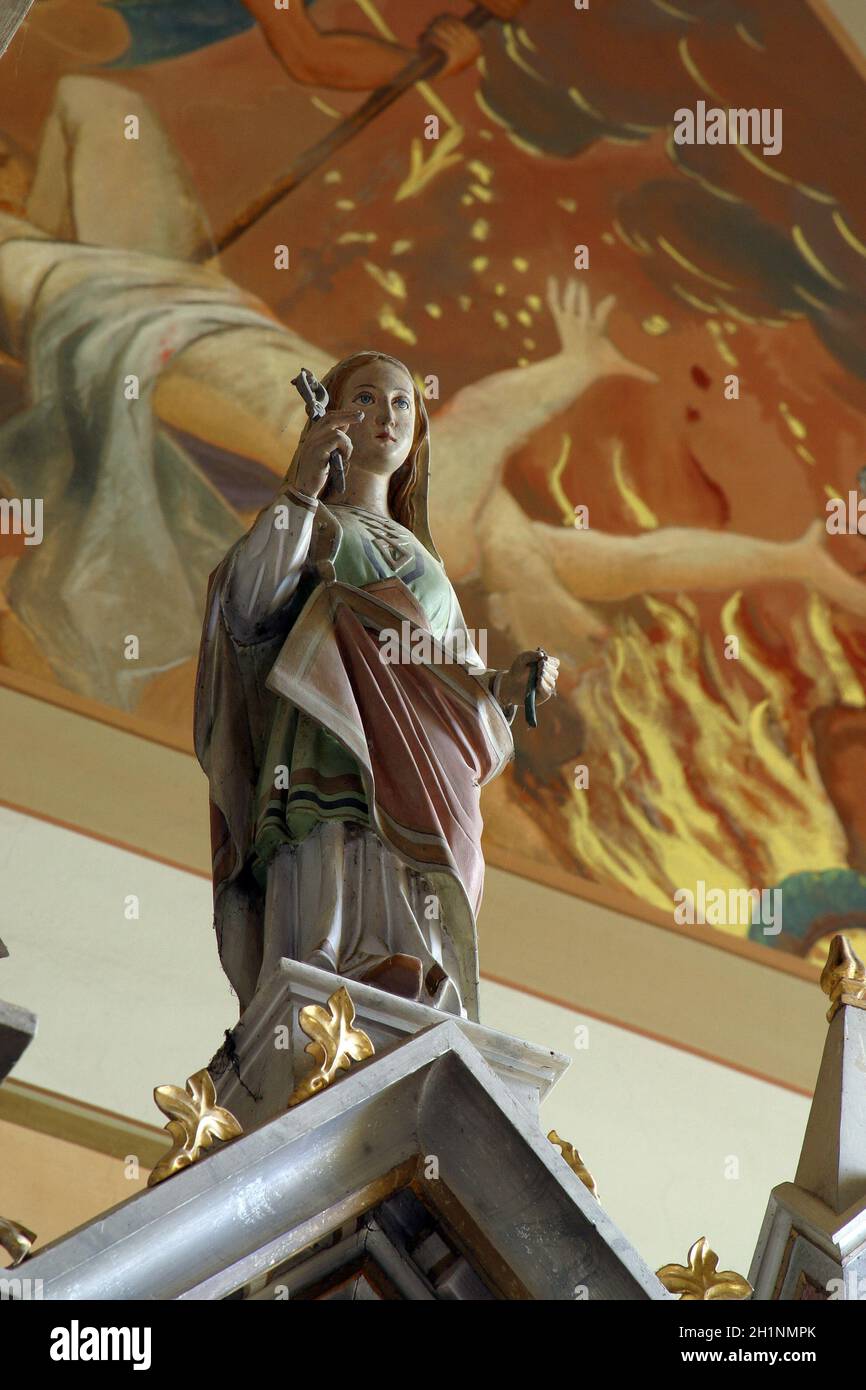 Die heilige Apollonia, Statue auf dem Hauptaltar in der Pfarrkirche