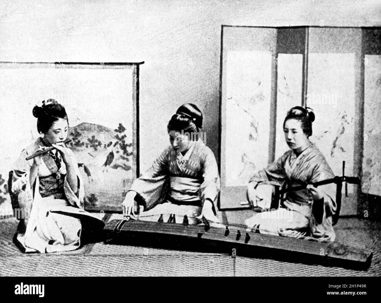 Flötenspiel, Samisen- und Koto-Musikinstrumente, Japan, Anfang des 20. Jahrhunderts Stockfoto