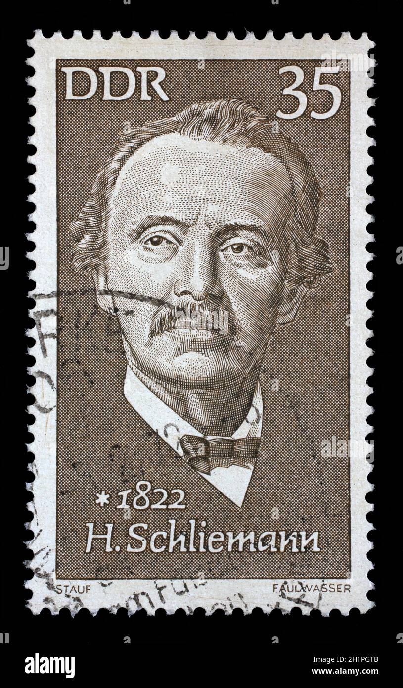 Gedruckt in DDR Stempel zeigt Heinrich Schliemann (1822-1890), Archäologe, ca. 1972 Stockfoto