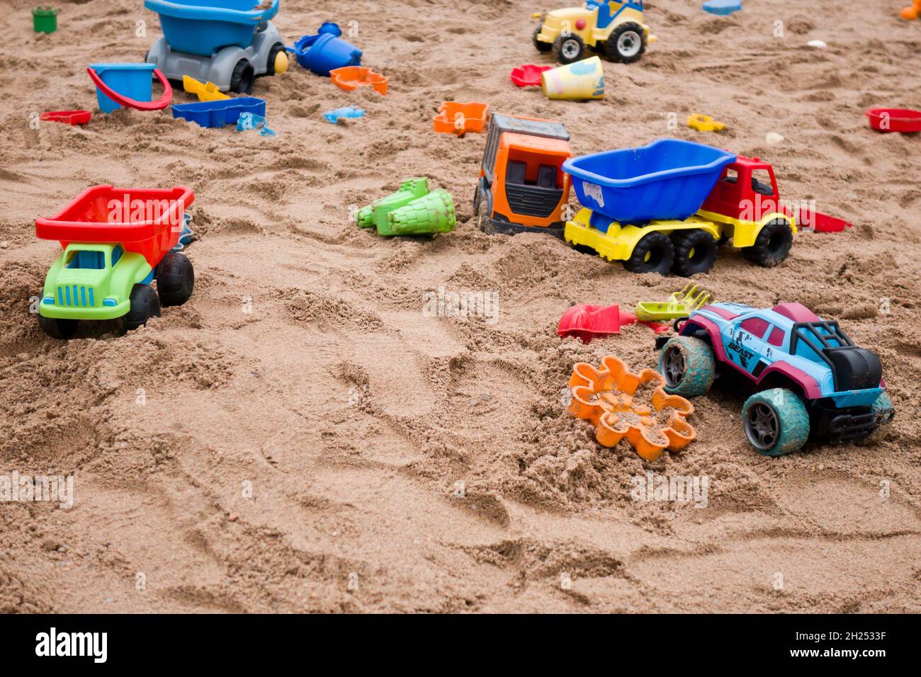 Kinder Spielzeug im Sand Stockfoto