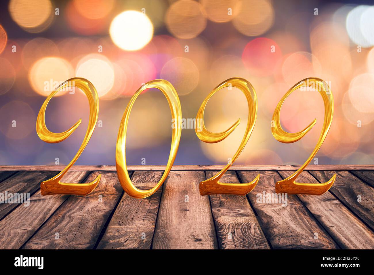 Golden 2022 auf Holztischplatte mit Hintergrund mit unscharfem Licht, Grußkarte zum Neujahr Stockfoto