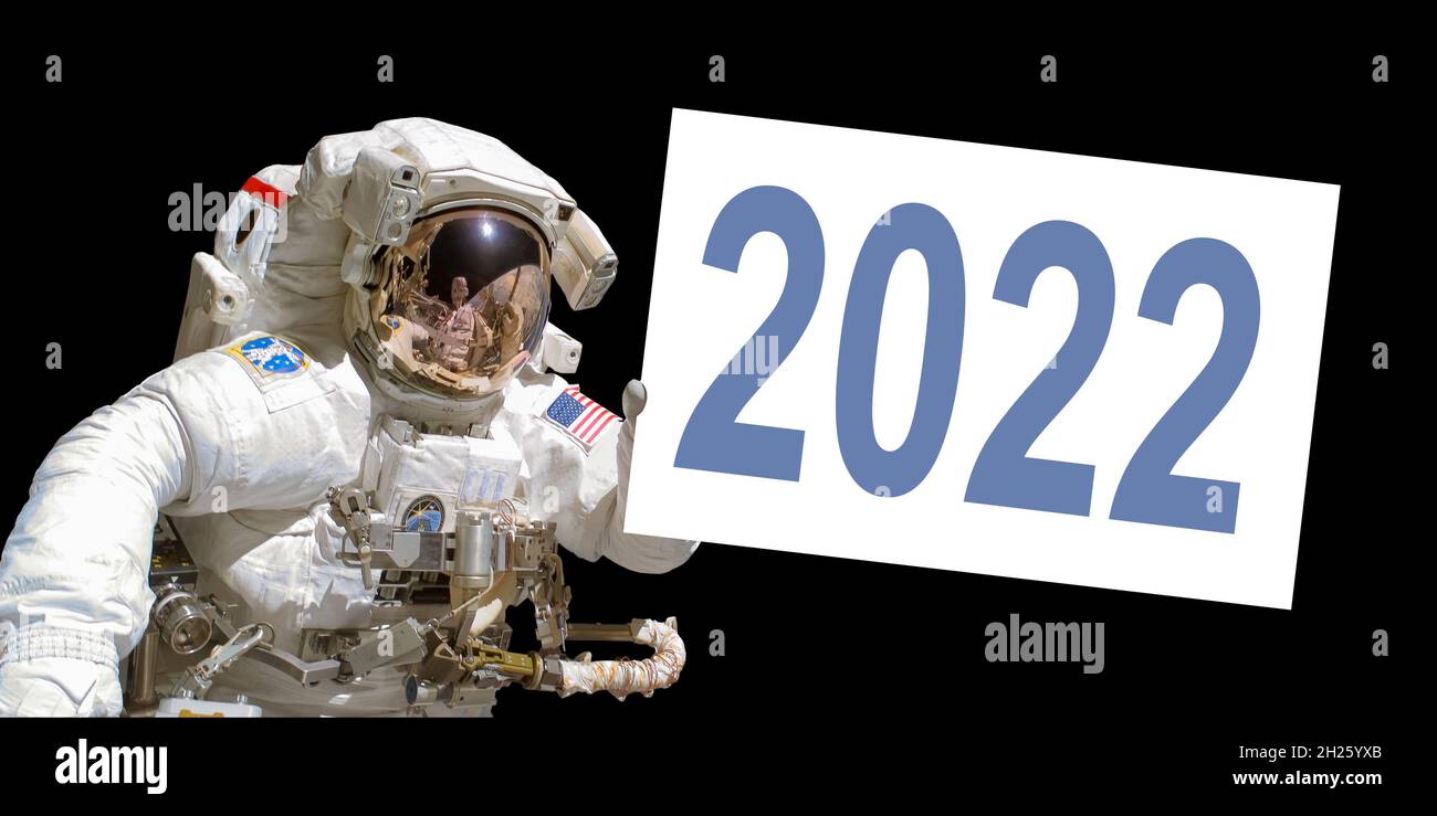 Astronaut im Weltraum mit einer 2022 Whiteboard - Elemente dieses Bildes werden von der NASA zur Verfügung gestellt Stockfoto