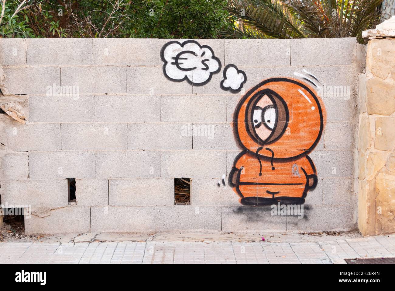 Cartoon-Charakter Graffiti auf BREEZE Block Wand gemalt Denken über Euro Geld in Can Pastilla Palma Mallorca Spanien Stockfoto