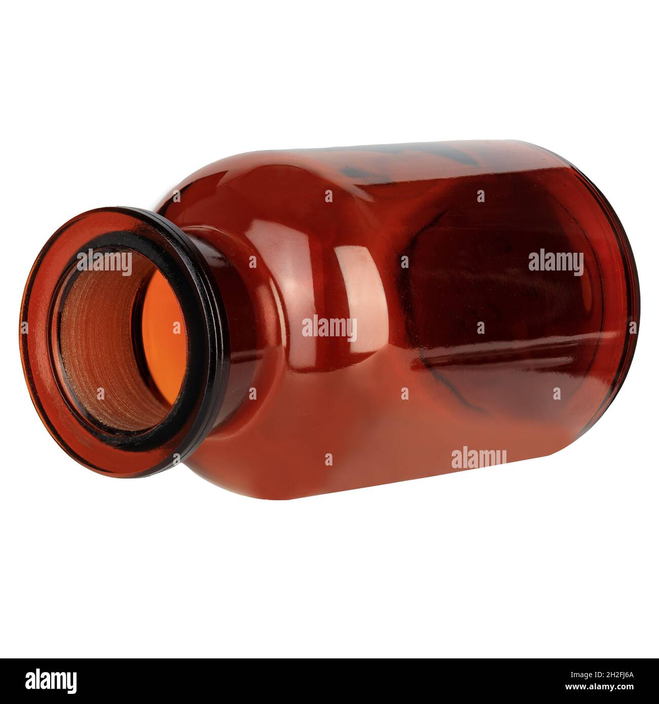 Geschlossene medizinische Flasche aus braunem Glas. Glasgefäße mit Chemikalien. Offene Flasche liegend Stockfoto