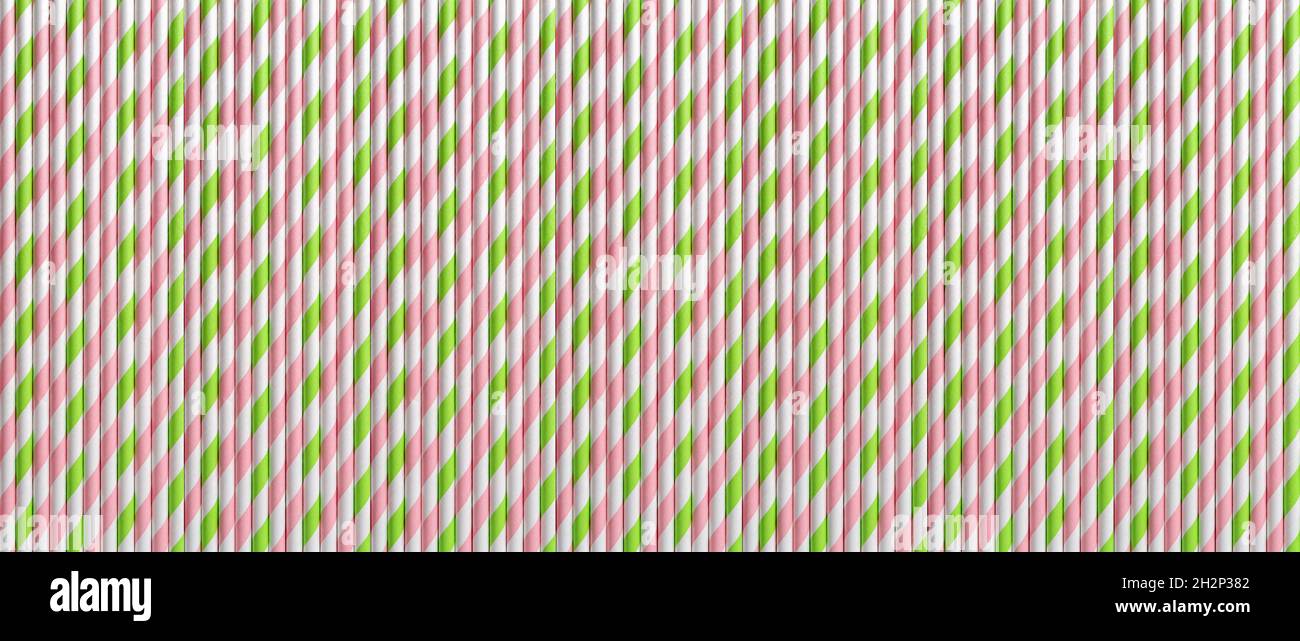 Vertikale Einweg rosa grün Trinkhalme Makro als Textur. Breite Banner Hintergrund von gestreiften Cocktail-Papierröhrchen. Stockfoto