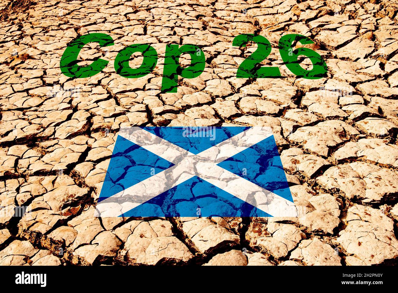 Flagge Schottlands auf gerissenem Erdhintergrund. COP 26, globale Erwärmung, Konzept des Klimawandels. Stockfoto