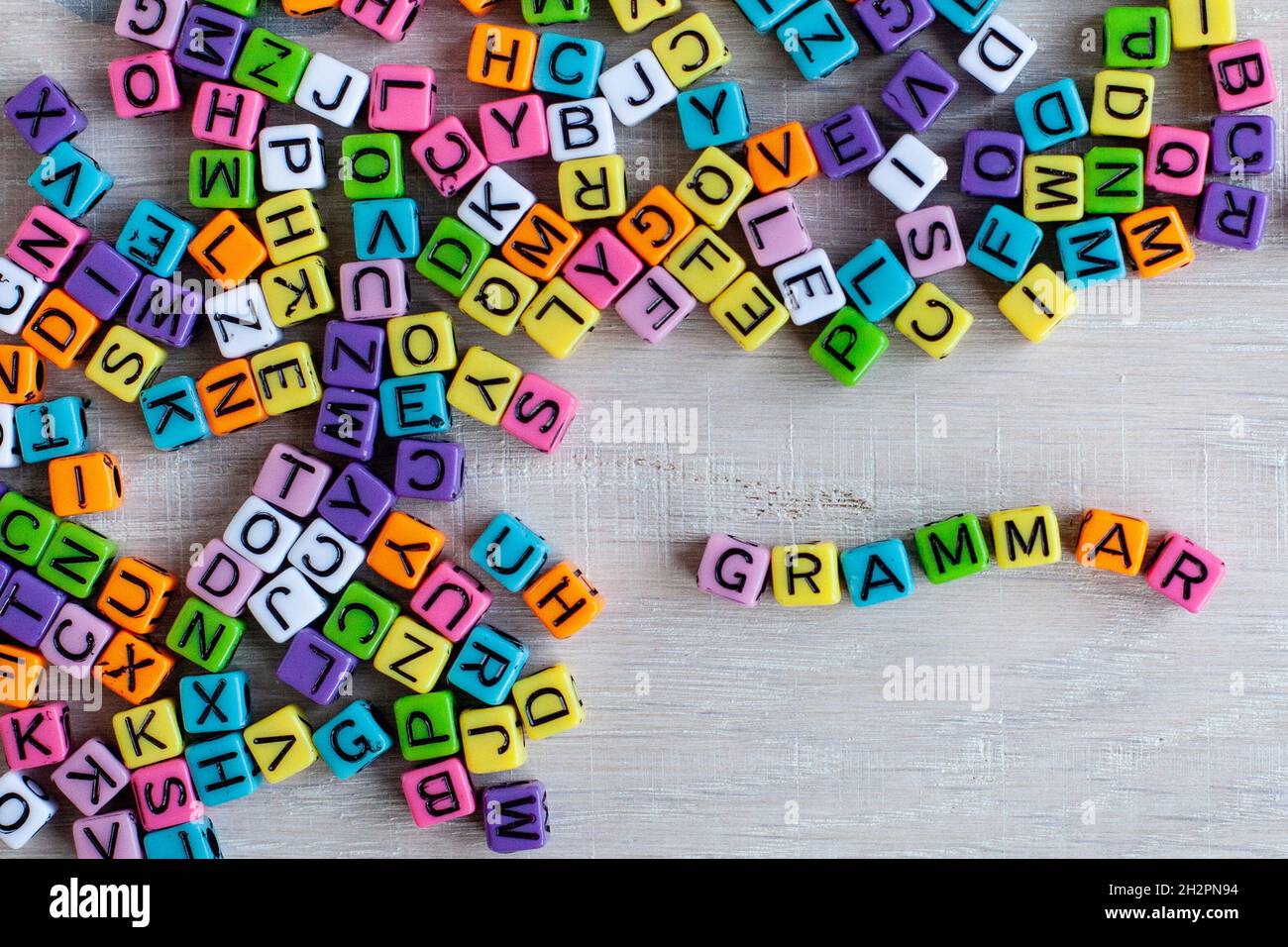 Grammatik, Sprachkonzept lernen, Wort aus mehrfarbigen Buchstaben Stockfoto