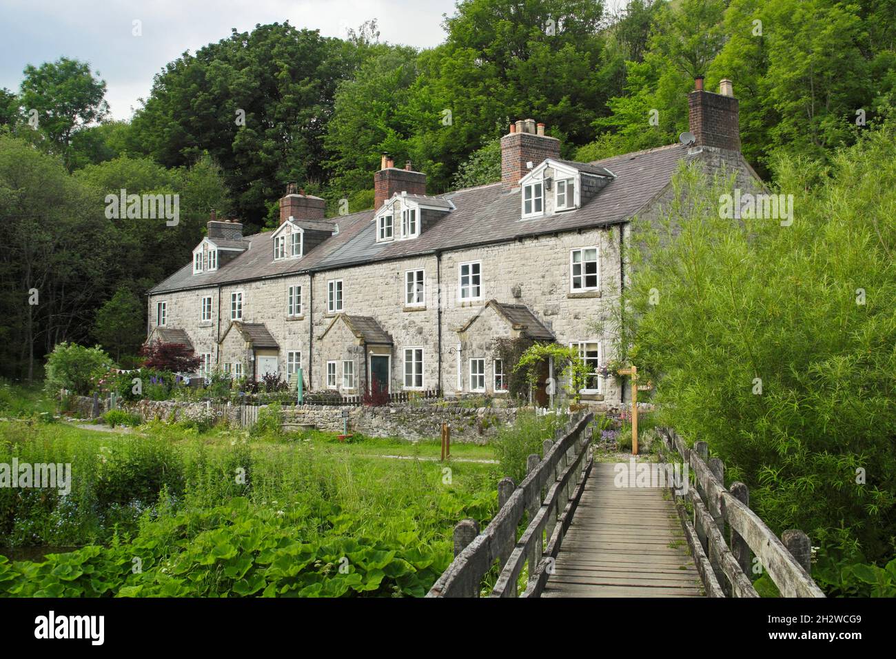 Blackwell Mill Cottages am Fluss Wye, Upper Wye Valley in der Nähe von Buxton, Peak District, Derbyshire, England, Großbritannien. Stockfoto