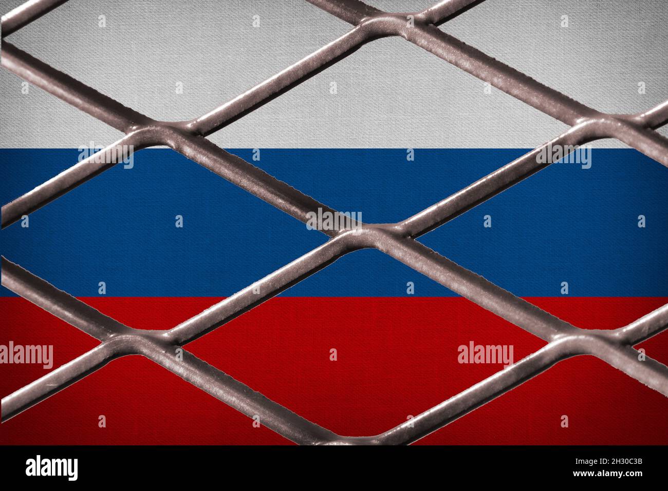 Flagge Russlands und ein Zaun Stockfoto