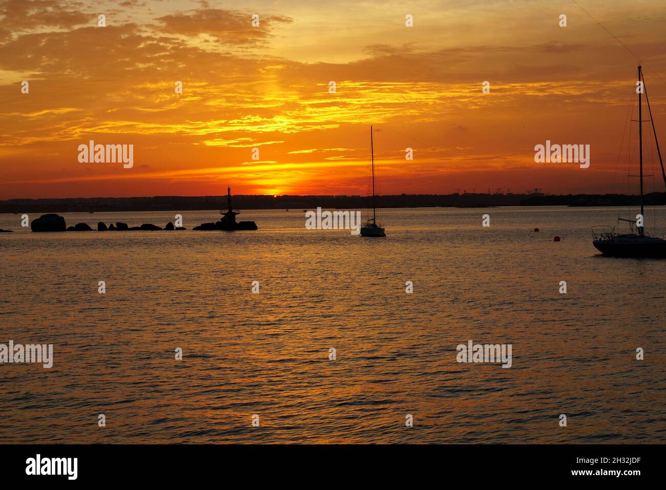 Wunderschöne Farben des Sonnenuntergangs im Changi Dorf Stockfoto