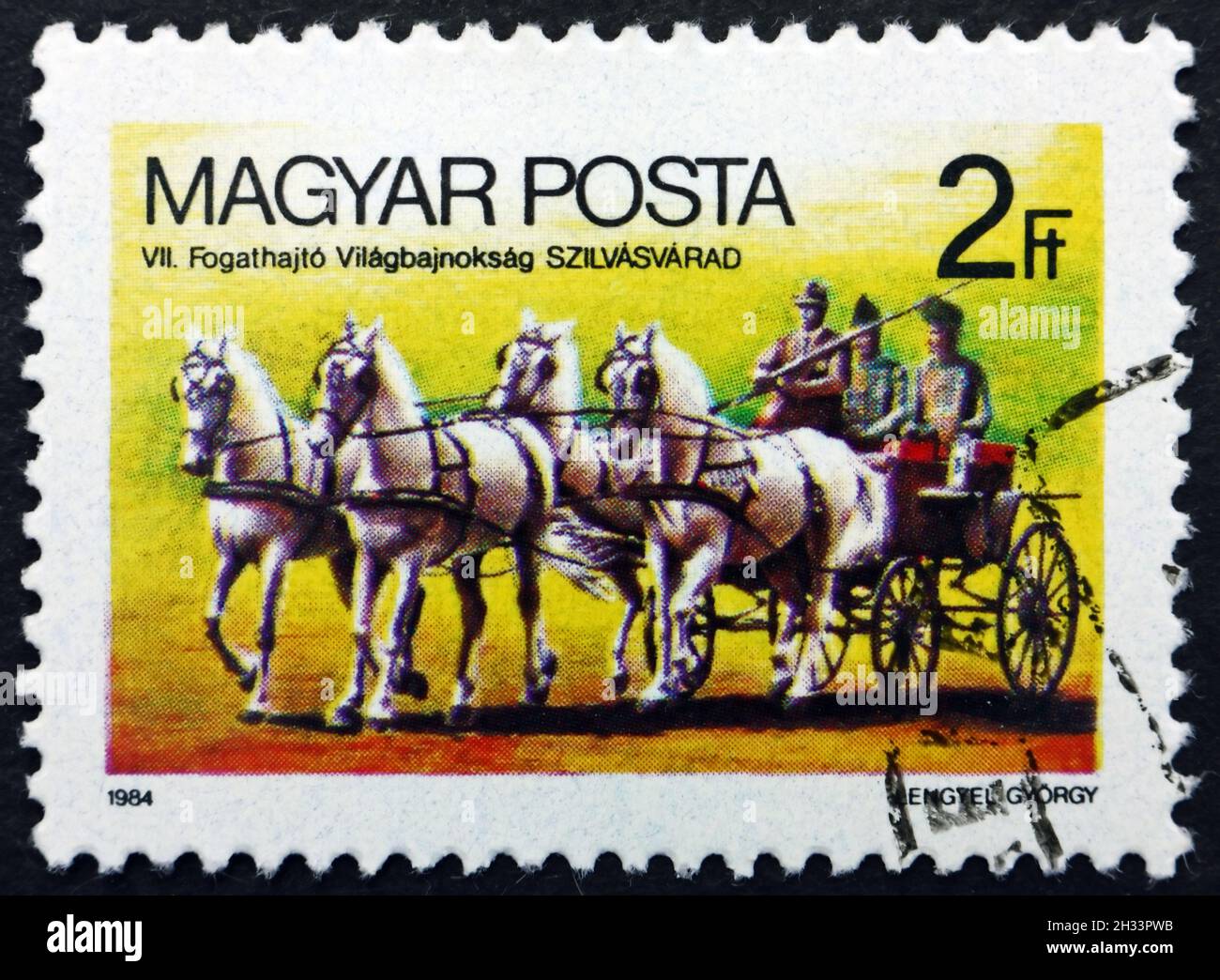 UNGARN - UM 1984: Eine in Ungarn gedruckte Marke zeigt Pferdewagen, Pferdemannschaft-Weltmeisterschaft, Szilvasvarad, um 1984 Stockfoto