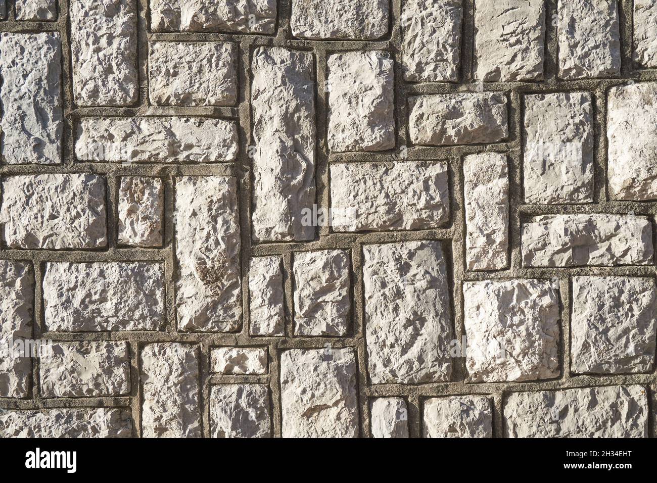 Struktur aus grauem Stein Wand aus Beton Stockfoto