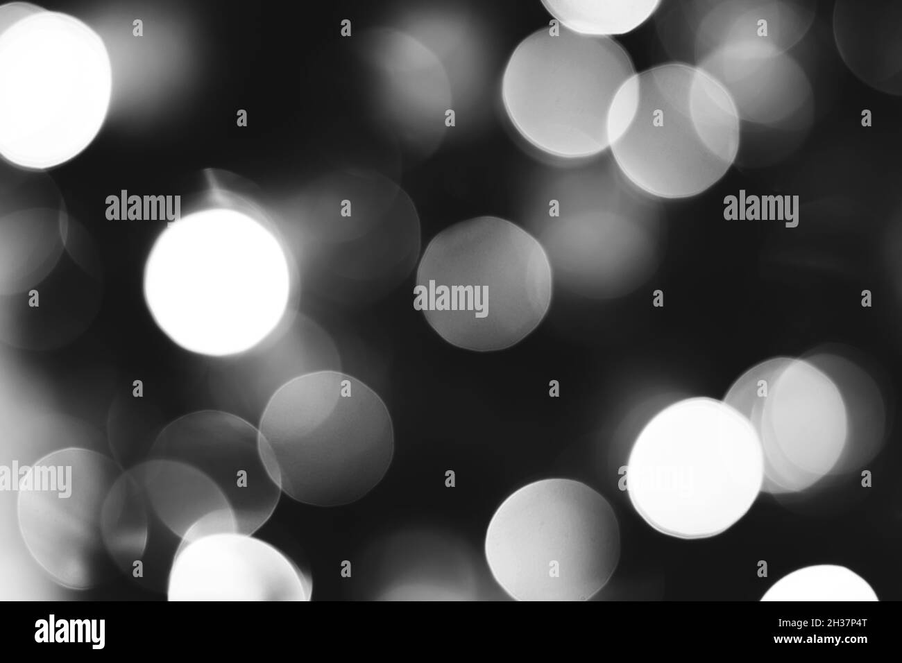 Verschwommenes Licht abstrakter Hintergrund. Weihnachtsfeiertage entkoketes Bokeh Stockfoto