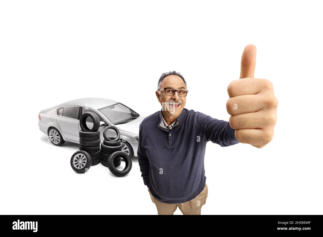 Ein Mann zeigt den Mittelfinger aus dem Auto Fenster Stock-Foto