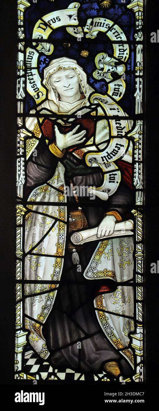 Ein Buntglasfenster von C E Kempe & Co., das Anna, die Prophetin, Tochter von Phanuel, St Andrew's Church, Denton, Lincolnshire, darstellt Stockfoto
