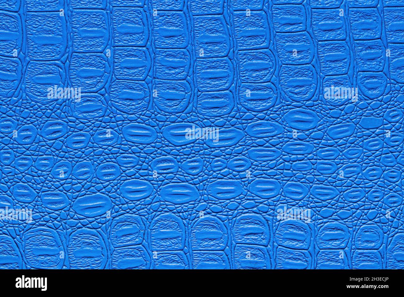Blaue Krokodillederstruktur. Abstrakter Hintergrund für Design. Stockfoto