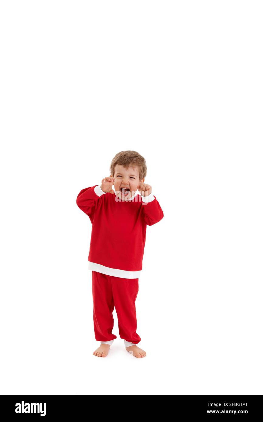 Kleiner Junge im weihnachtsmann Kostüm brüllend Stockfoto