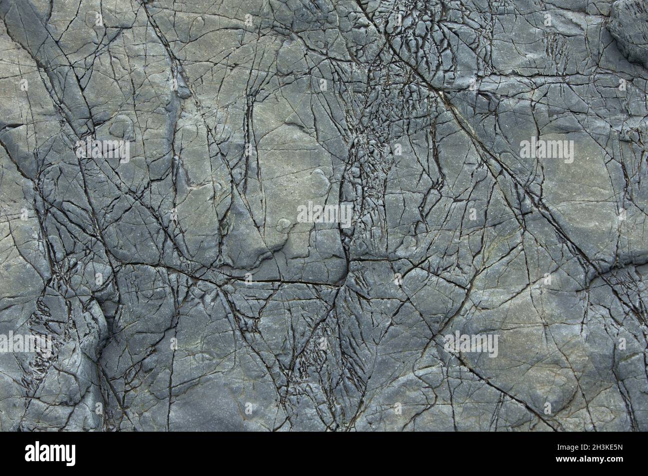 Naturstein Hintergrund mit Rissen. Nähe zu sehen. Stockfoto