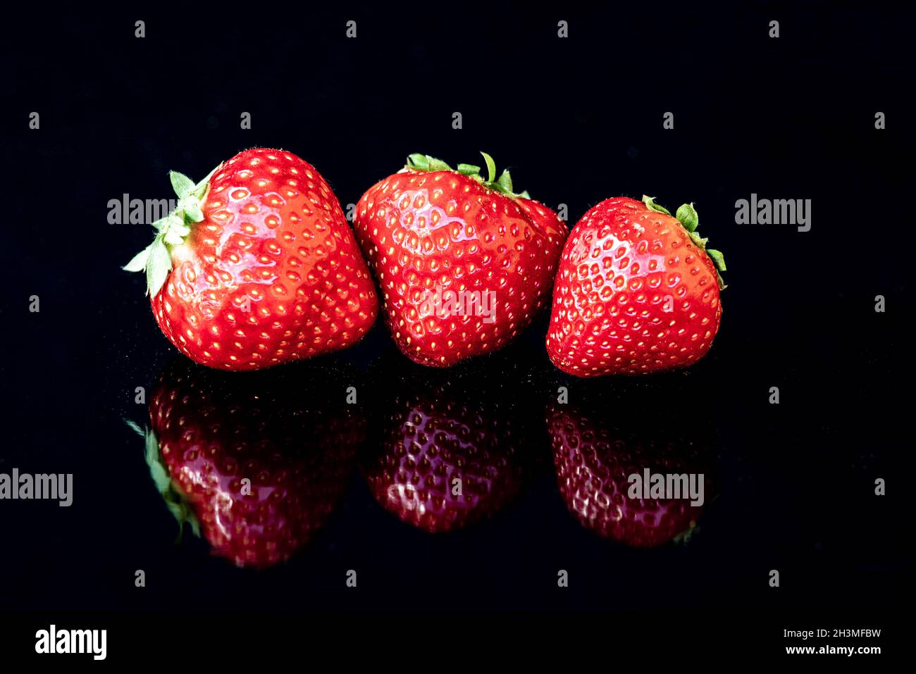 Feine rote Erdbeeren Stockfoto