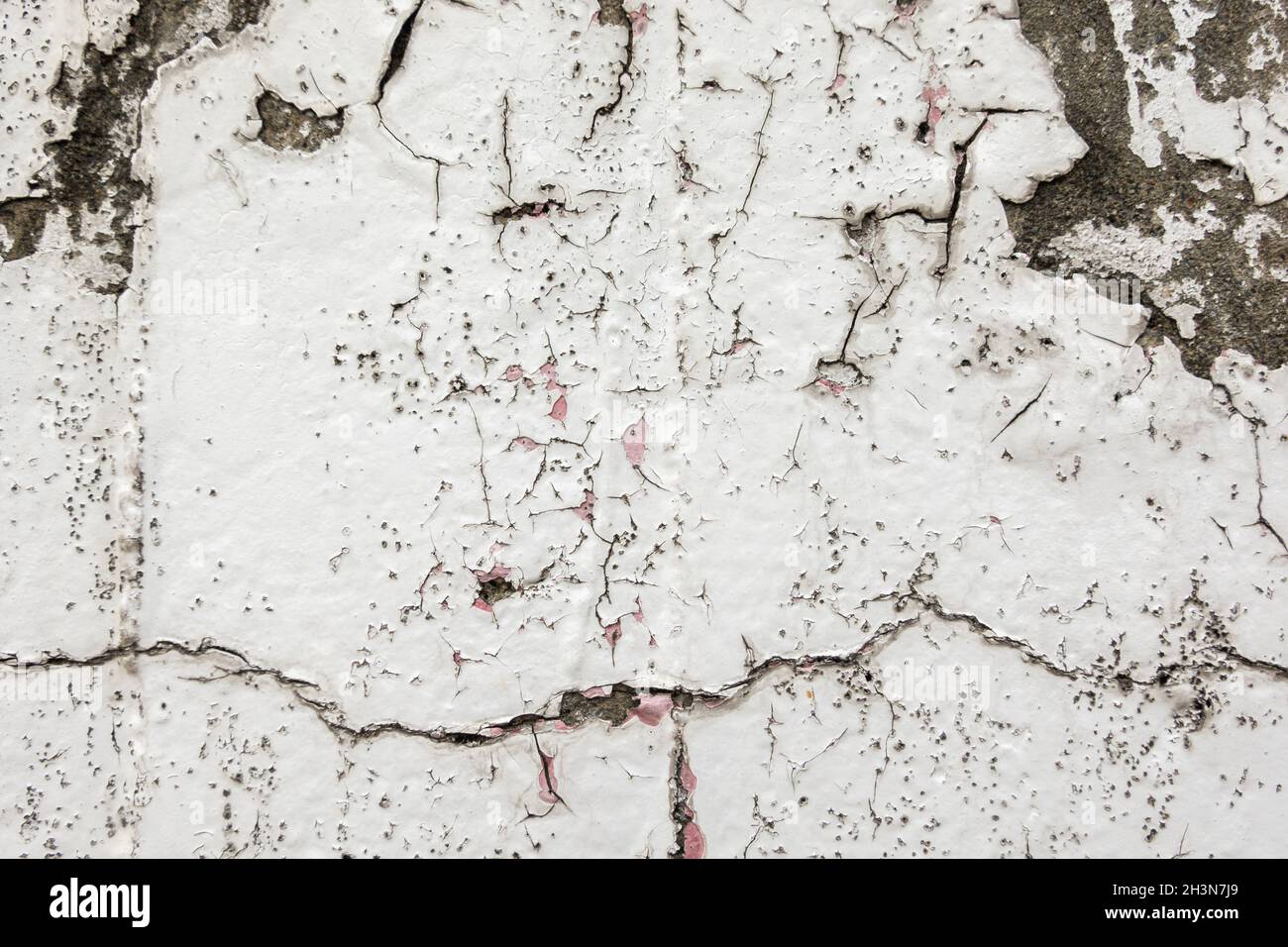 Weiße verwitterte Wand Stockfoto
