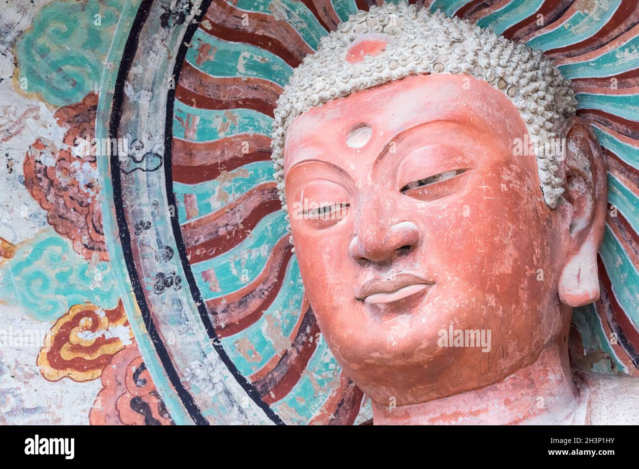 Figur des buddha in den Maiji-Berggrotten Stockfoto