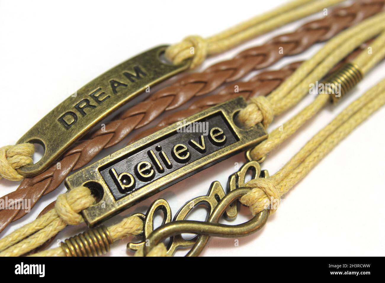 Believe, Love and Dream Symbole auf Weiß Stockfoto