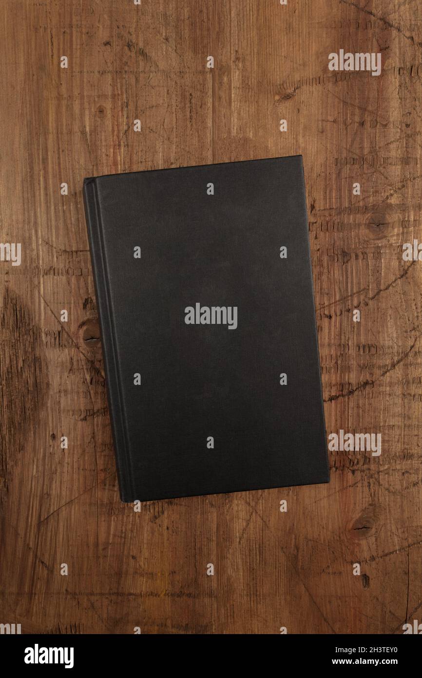 Ein overhead Foto mockup eines schwarzen Buch mit einem Platz für Text Stockfoto