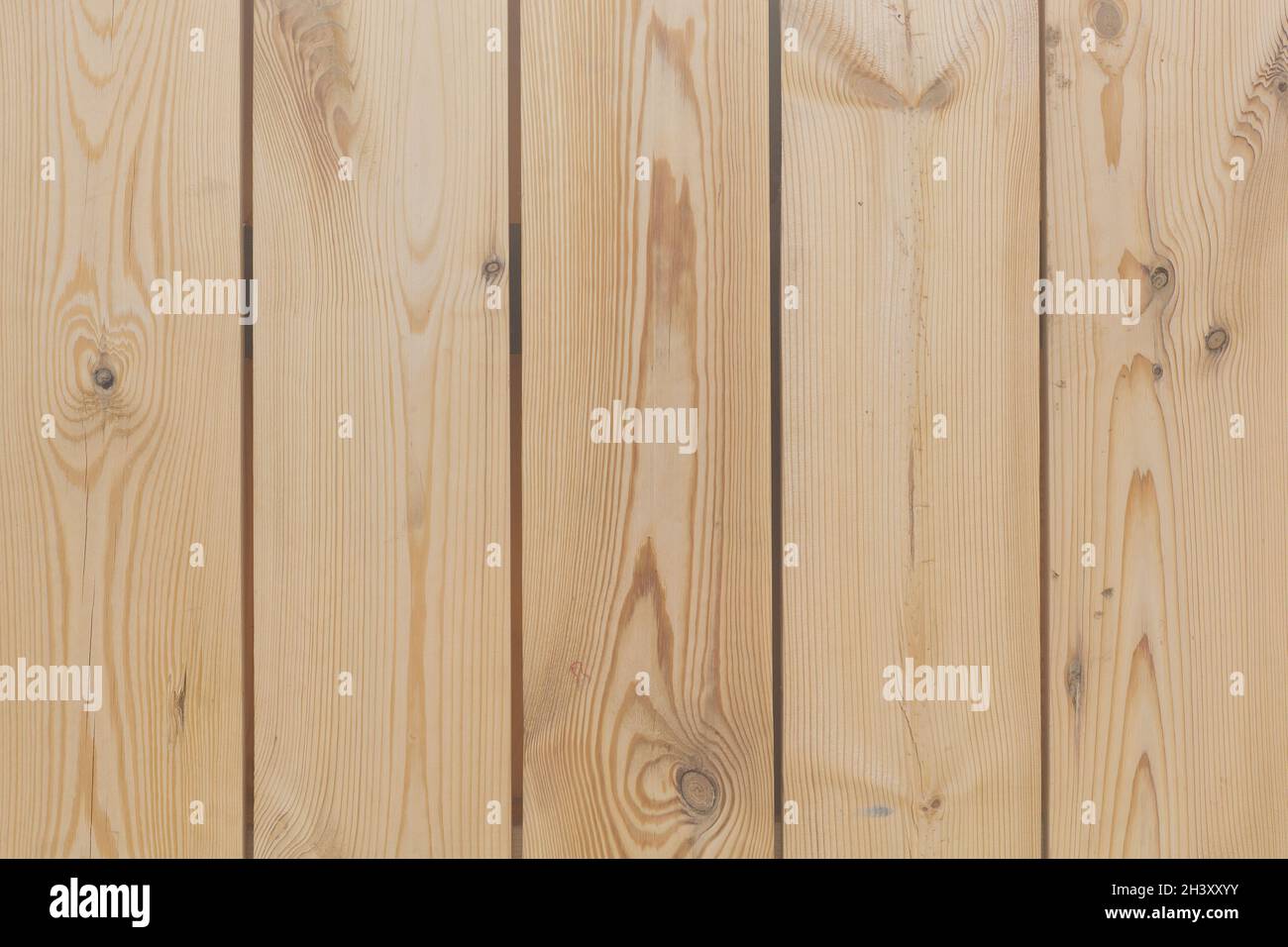 Hintergrund von den vertikalen Holz unbemalten Bretter Stockfoto