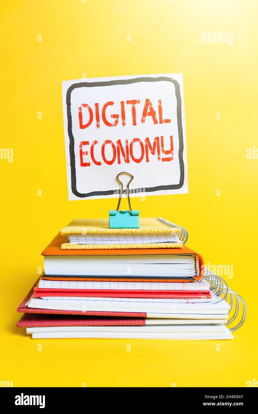 Schild mit der Anzeige „Digital Economy“. Geschäftskonzept wirtschaftliche Aktivitäten, die auf digitalen Technologien basieren bunte Idee Prese Stockfoto