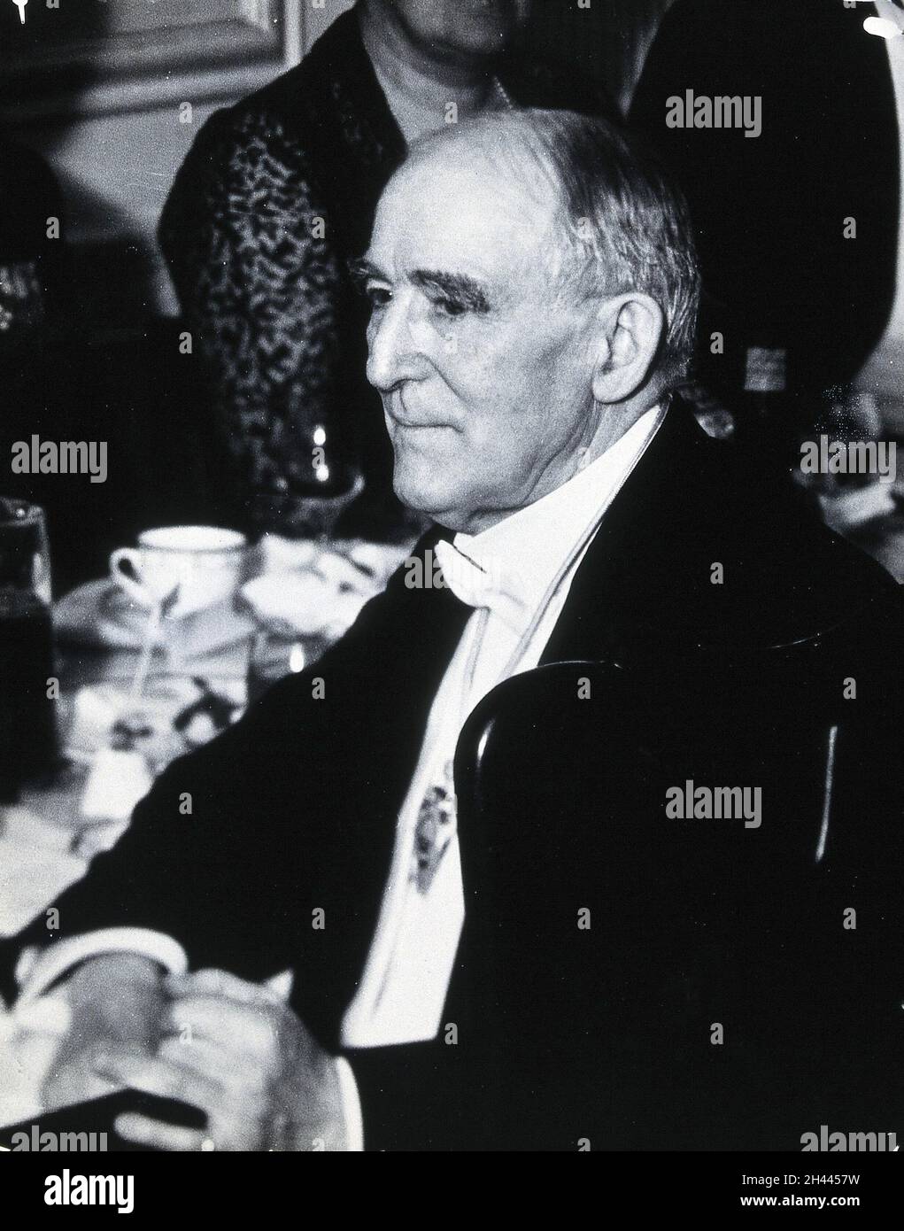 Henry Solomon Wellcome beim Abendessen anlässlich der Eröffnung der Cinchona-Ausstellung. Foto, 1930. Stockfoto