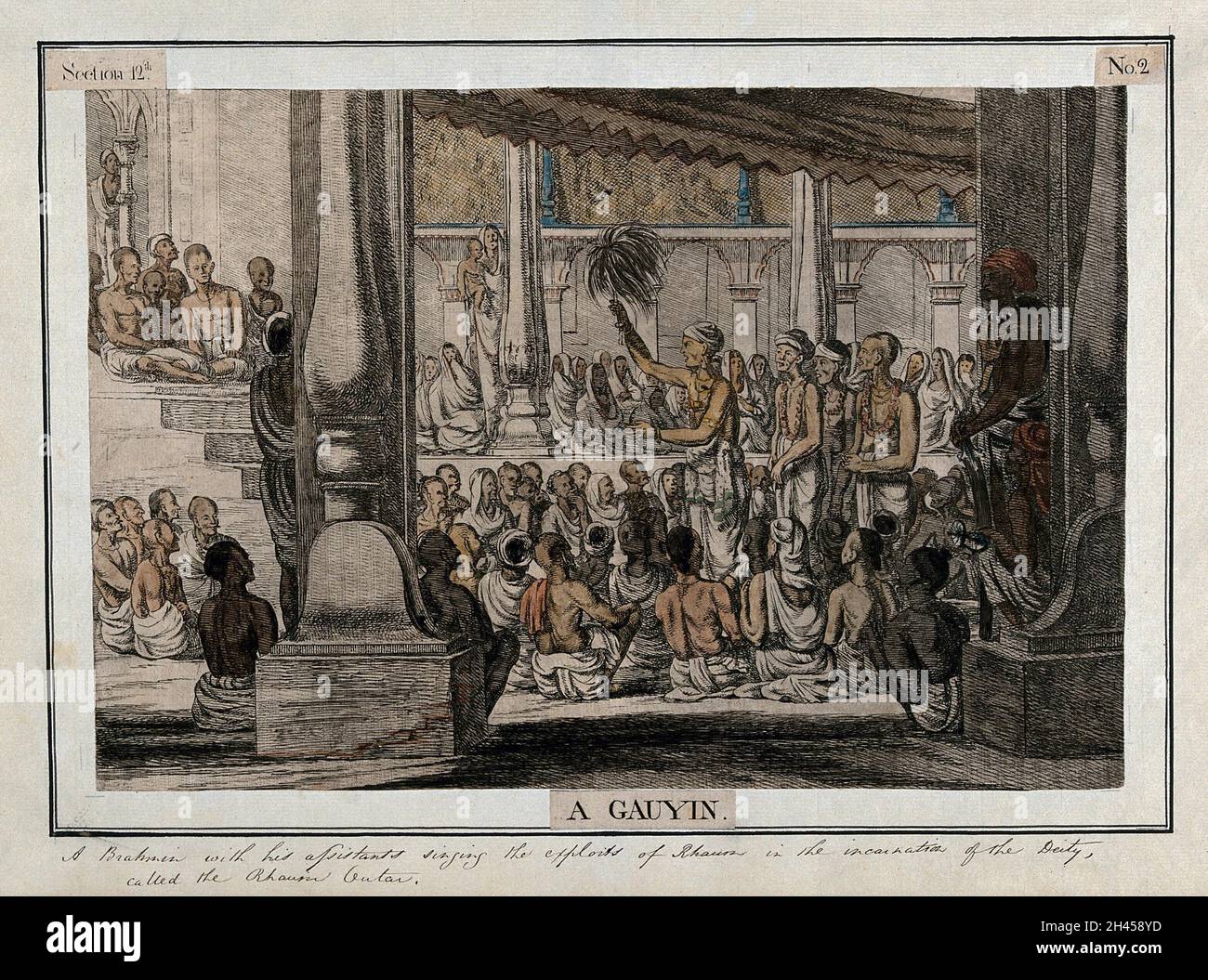 Hindu-Priester, oder Brahmane, und Assistenten, singen vor einer sitzenden Audienz, Kalkutta, Westbengalen. Kolorierte Radierung von François Balthazar Solvyns, 1799. Stockfoto